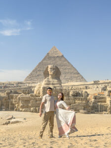 Kamy and Eric in front of the Great Sphinx of Giza and the Pyramid of Khafre
